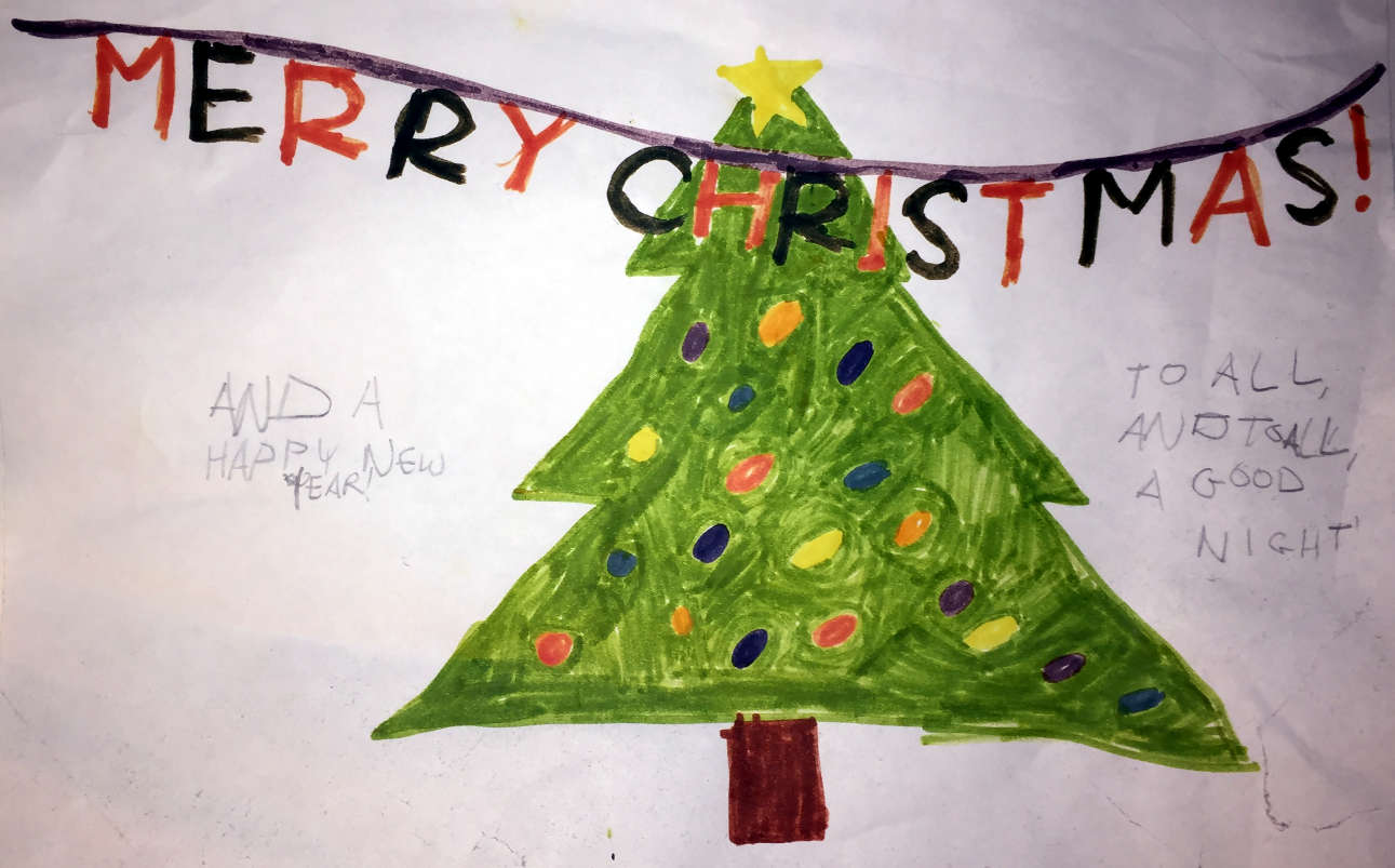 A green Christmas tree with circular ornaments of various colors hanging on it.  In front of that, the phrase "MERRY CHRISTMAS!" is hanging on a thing, with letter alternating between red and black (or is that brown?).  On one side of the tree, it says, "TO ALL, AND TO ALL A GOOD NIGHT!", and on the other side, it says, "AND A HAPPY NEW YEAR!"